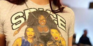 A close-up of a t-shirt with a photo of the Spice Girls on the front
