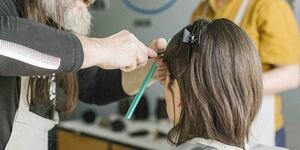 Image of a man cutting hair.