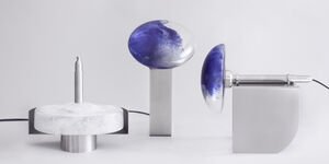 An image of three blue metallic items.