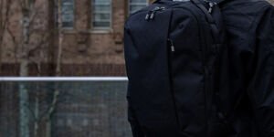 Image of a man wearing a backpack.