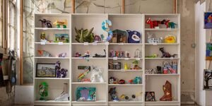 Image of artwork on shelves.