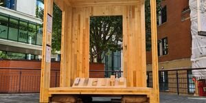 Image of the wood installation in the courtyard.