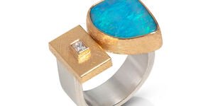 Image of a gold opal ring.