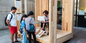 Image of a man demonstrating an installation.