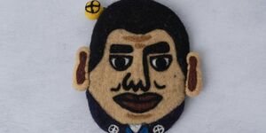 Painting of a man's face.