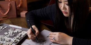 Image of Loveness making a ring.
