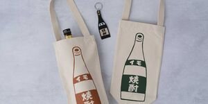 Tote bags will bottles designed on them.