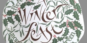 Image of a decorated plate that says A Winter's Feast