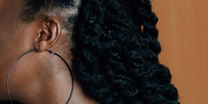 Image of a woman wearing braids.