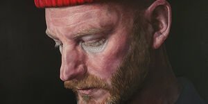 Painting of a man wearing a red beanie.