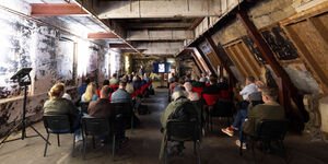 Image of a talk happening in Bargehouse.