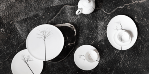 Image of white teapots and saucers