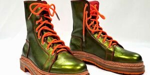 Image of a pair of green metallic boots.