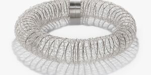 An image of a silver bracelet made by JeDeCo.