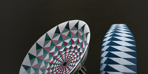 Two circular blue ceramics.