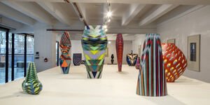Image of a set of ceramics in a gallery.