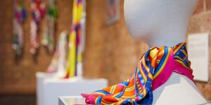 An image of Gina's scarf on a mannequin.