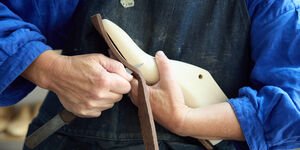 Image of someone making shoes.