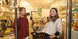 Image of Ryoko and Yuko in the studio entrance.