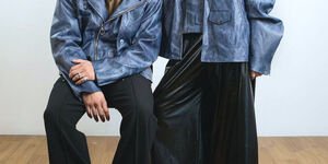 Image of 2 people wearing leather jackets.