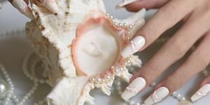 Image of a woman holding a candle.