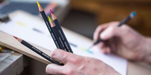 Image of someone sketching.