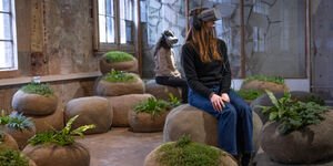 Image of a woman taking part in VR.