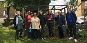 Group in front of beds