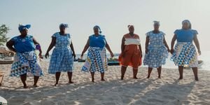 Image of a group of women on a beach.