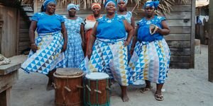 Image of a group of women on a beach.