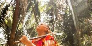Image of a woman in a forest.