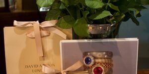 Image of a ring gift set with flowers.