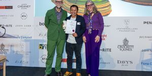 Image of Carreducker presenting an award.