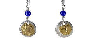 Image of gold coin earrings.