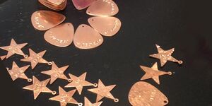 Close up image of engraved pendant.