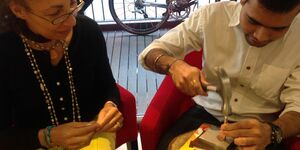 Image of Catherine Marche working on jewellery.