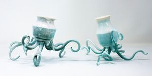 An image of two of Rose's ceramics that both have tentacles.