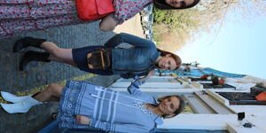 Image of women modelling dresses.