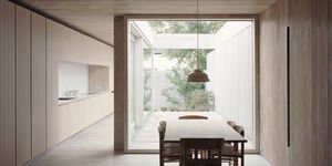 Image of a house with a wood table and walls.