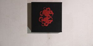 Art piece on a wall.