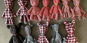 Image of a row of teddy bears.