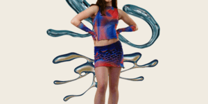 Image of a woman modelling with a blue and red shirt.