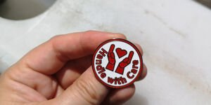 Image of a ring that says handle with care.