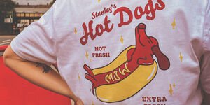 A woman modelling the back of the shirt.