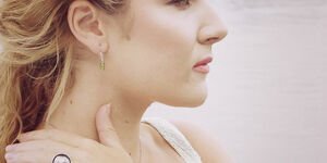 Image of a woman modelling a ring.