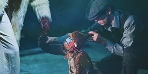 Image of a man performing on stage.