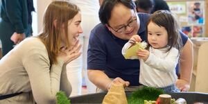 Child plays with parents