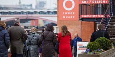 People walking past Oxo Tower Wharf