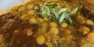 A plate of vegan doubles from LIMIN SOUTHBANK.