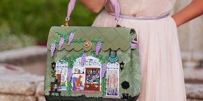 Image of a green leather handbag.